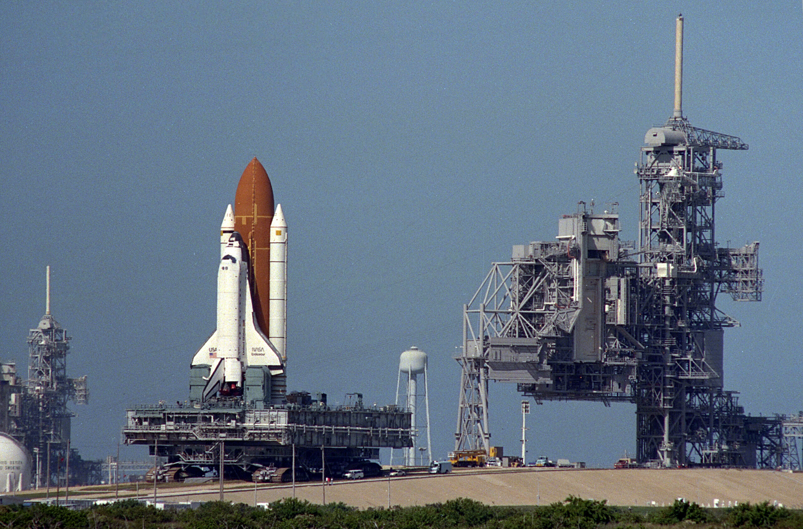The STS-61 crew of Kenneth D. Bowersox, sitting left, Kathryn C. Thornton, F. Story Musgrave, and Claude Nicollier of the European Space Agency; Richard O. Covey, standing left, Jeffrey A. Hoffman, and Thomas D. Akers