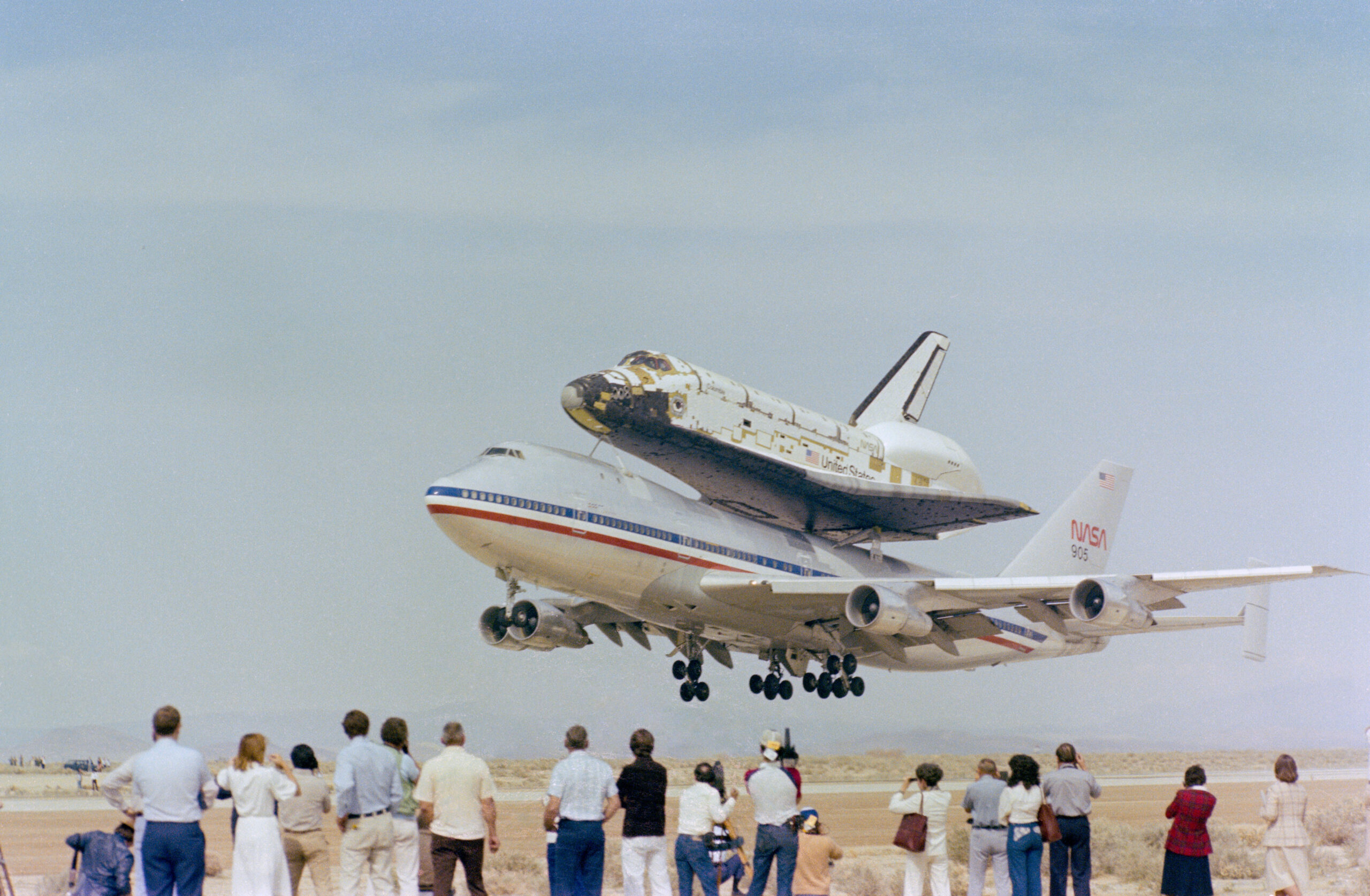 Workers roll Columbia out from its hangar at Rockwell’s Palmdale, California, plant
