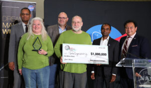 : The husband-and-wife duo of Terra Engineering, Valerie and Todd Mendenhall, receive the $1 million prize June 12, for winning the final phase of NASA’s Break the Ice Lunar Challenge at Alabama A&M’s Agribition Center in Huntsville. With the Terra Engineering team at the awards ceremony are from left, Daniel K. Wims, Alabama A&M University president; Joseph Pelfrey, NASA Marshall Space Flight center director; NASA’s Break the Ice Challenge Manager Naveen Vetcha, and Majed El-Dweik, Alabama A&M University’s vice president of Research & Economic Development.